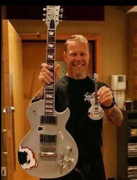 James Hetfield with Grey Truckster Mini Guitar